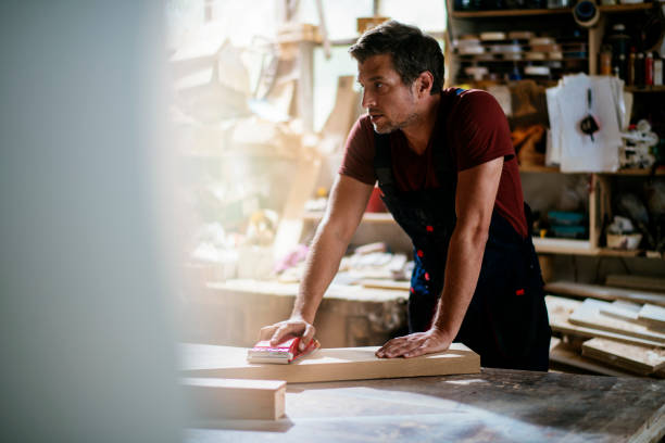 istock Young handsome carpenter stock photo 1165703382