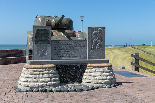 Westkapelle, The Netherlands - June 28, 2019: Military tank at dike near Westkapelle, battlefield of WW2 for protection belgian harbor of Antwerpen