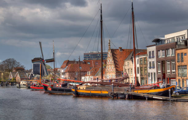 istock Historical boats on a canal in Leiden, Holland 1165711708