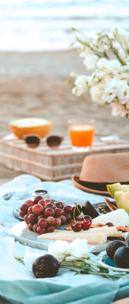 istock Seaside beach picnic concept on shore sand 1165713414