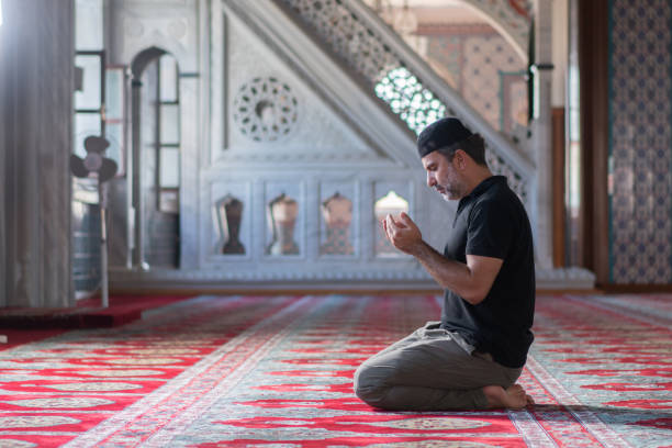 istock Muslim men prayer in mosque 1165713436
