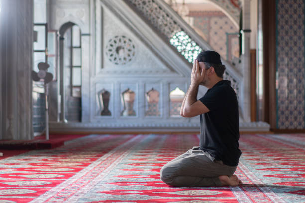 istock Muslim men prayer in mosque 1165713464