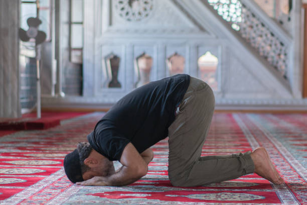 istock Muslim men prayer in mosque 1165713538