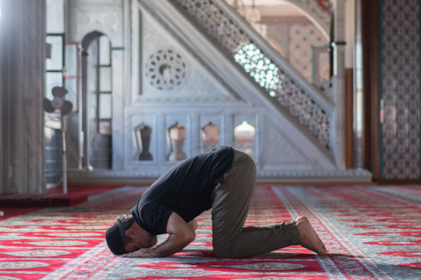 istock Muslim men prayer in mosque 1165713648