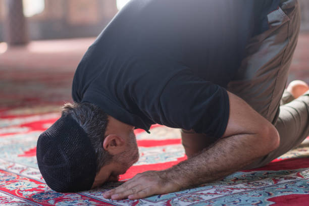 istock Muslim men prayer in mosque 1165714208