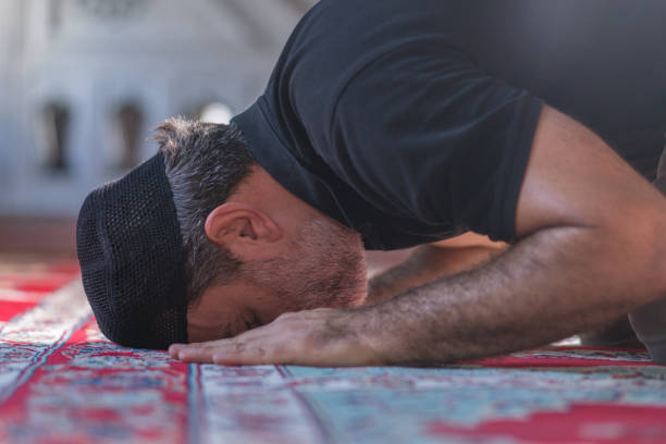 istock Muslim men prayer in mosque 1165714297