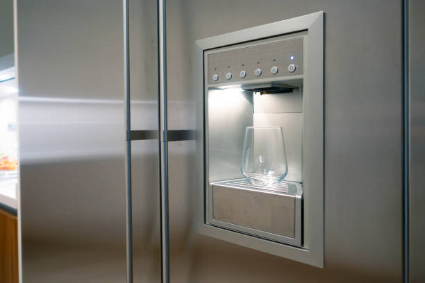 istock Refrigerator Ice and Water Dispenser with glass 1165714934