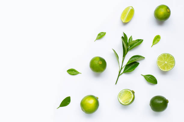 istock Limes with leaves isolated on white background. 1165716108