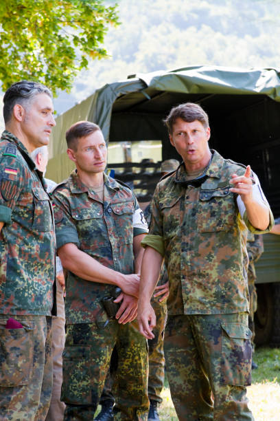 istock Three military officers at briefing 1165721419