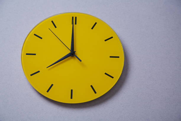 istock Time management deadline and schedule concept: yellow clock. Close up 1165721551
