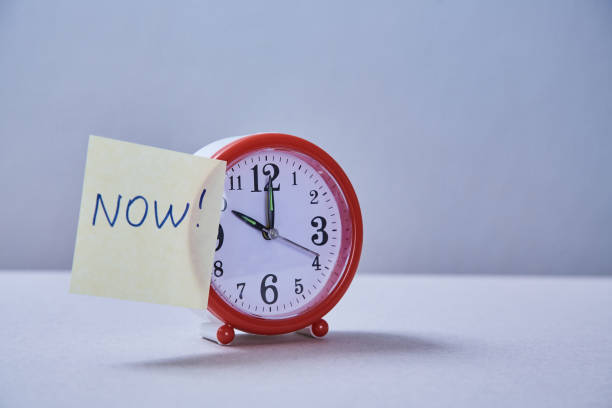 istock Time management deadline and schedule concept: alarm clock and stickers with different inscriptions 1165721564