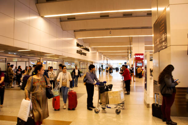 Indira Gandhi International Airport with passenger arriving and departing in New Delhi, India stock photo