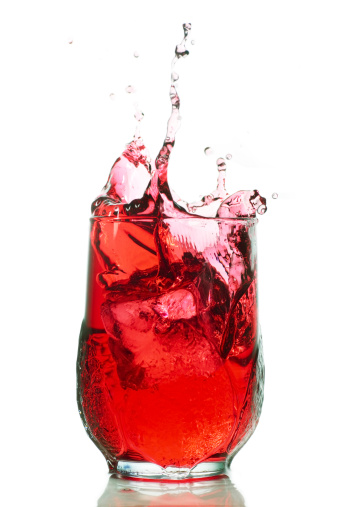 splash of red liquid could be cranberry juice, grape juice