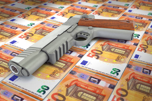 istock euro banknotes corruption and gun 1165726978