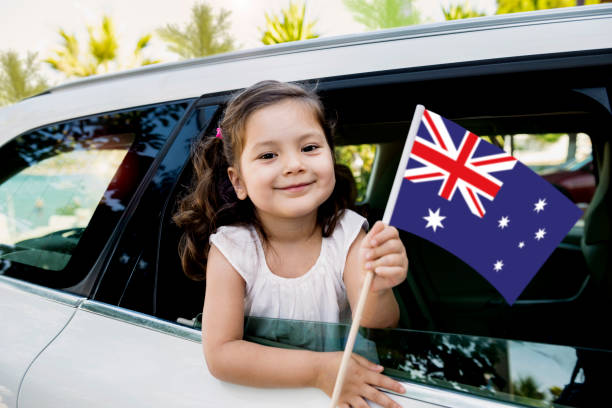 istock Girl Holding Australian Flag 1165727637