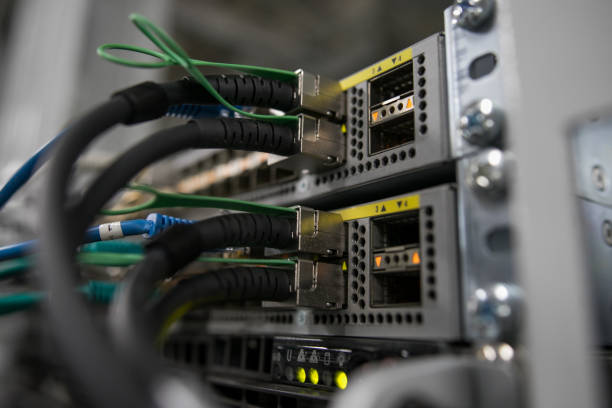 istock Fiber Optical connector interface. Fibre Channel swich. Severs computer in a rack at the large data center. 1165729734