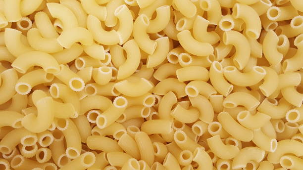 istock Italian penny pasta background 1165730836