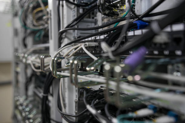 istock Fiber Optical connector interface. Fibre Channel swich. Severs computer in a rack at the large data center. 1165731046
