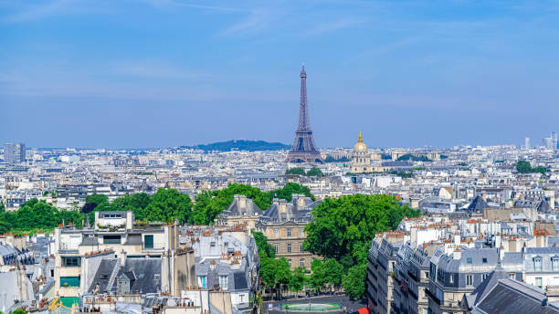 istock Paris, typical roofs, aerial view with the Eiffel Tower 1165737151