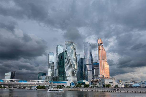 Skyscrapers of the business district in Moscow city on the background of rain clouds stock photo