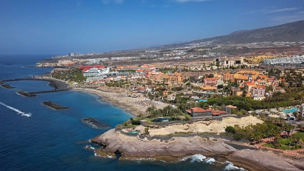 aerial panorama of costa adeje resort and playa del duque beach, tenerife, canary islands, spain. - playa de las américas imagens e fotografias de stock