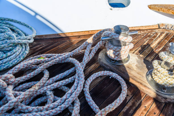 istock Thick ropes and different tackles on a yacht 1165741718