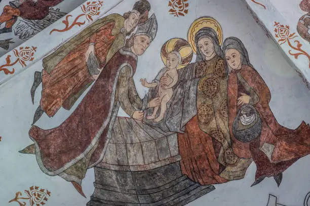 the circumcision of Jesus, a wall-painting from about the year 1500 in the church of St. Mary, Elsinore, Denmark, May 14, 2019
