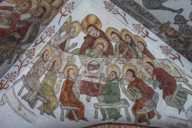 istock Lord's Supper with a wild boar on the plate, a wall-painting 1165742259