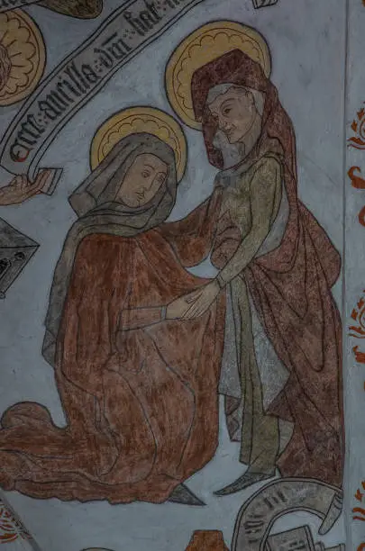 The visitation, Virgin Mary pays a visit to Elisabeth, a wall-painting from about the year 1500 in the church of St. Mary, Elsinore, Denmark, May 14, 2019