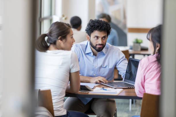 istock Personal banker listens to a client's story 1165742849