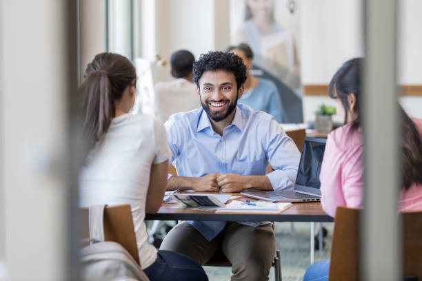 istock Financial counselor and clients laugh together 1165742854