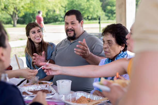 istock Mature man tells story during meal 1165743034
