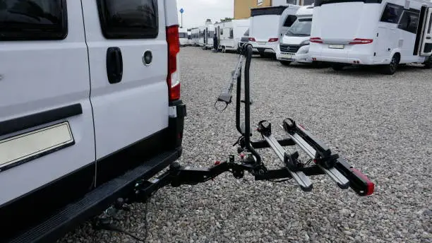 Bicycle rack at motorhome or van. Swiveling rear carrier for 2 bicycles.