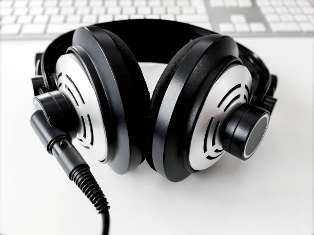 istock professional headphone in black and white on a white table 1165754599