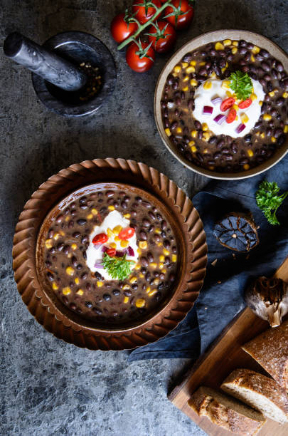 istock Vegetarian black bean soup with corn, tomatoes and sour cream 1165755220