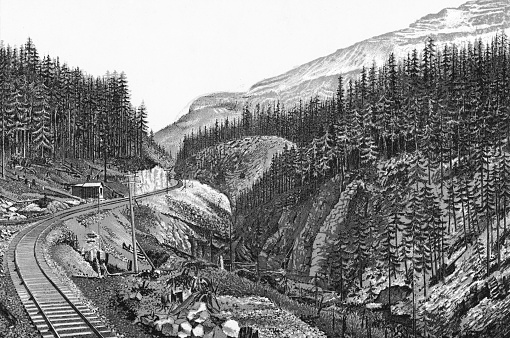 Kicking Horse Pass in the Canadian Rockies of Alberta, Canada. Vintage etching circa late 19th century. Alberta became a province in 1905, until then it was part of the Northwest Territories.