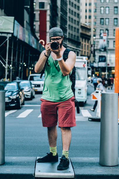 istock Millennial man visiting New York City 1165770654