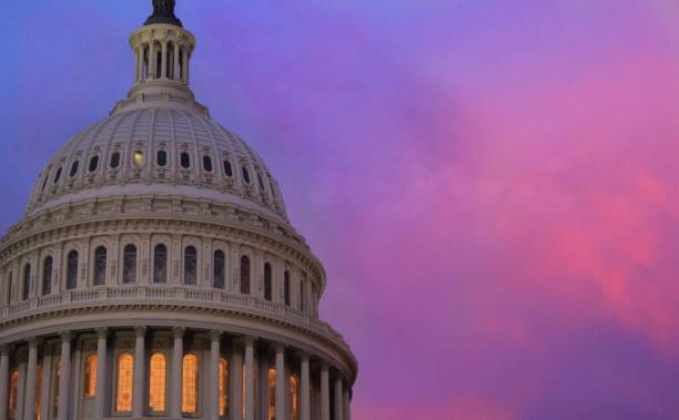 United States Capitol at sunset The Capitol Rotunda at sunset, summer 2019 rotunda stock pictures, royalty-free photos & images