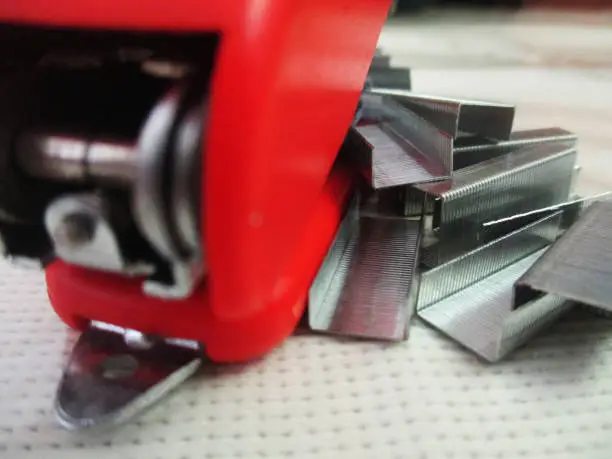 Photo of Close up photograph of back side stapler with staples