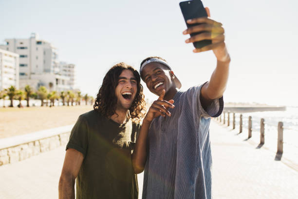 istock Friends making a selfie by seaside promenade 1165772975