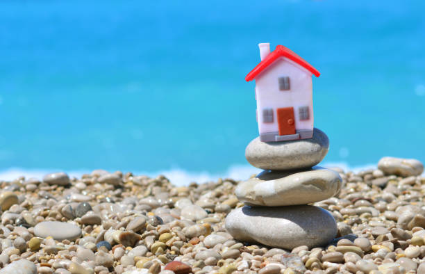 istock Cottage lodge by the sea concept 1165774146