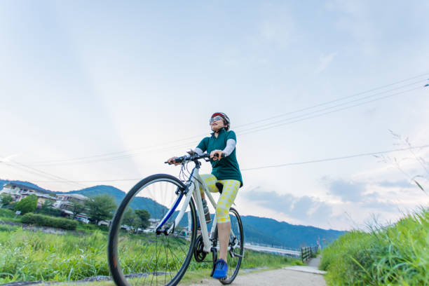 Senior woman enjoying cycling