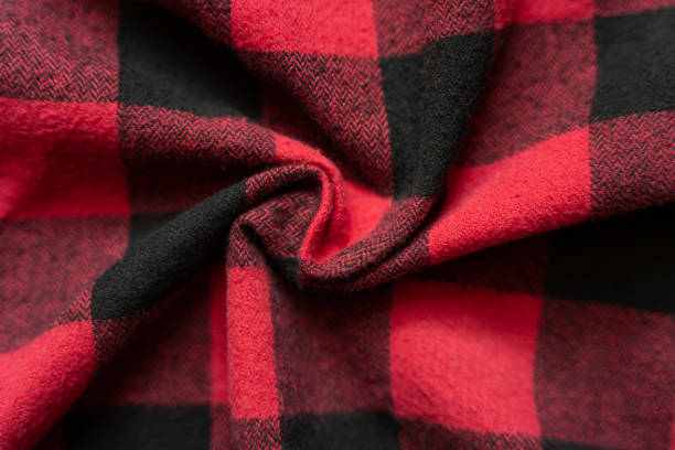 istock Crumpled Black and Red Fabric in a Cage 1165776298