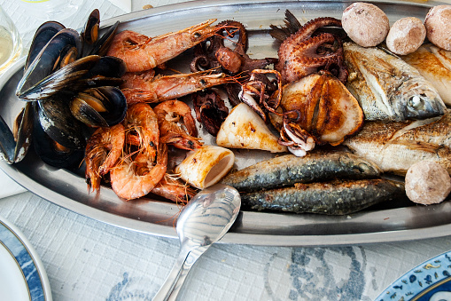 Exquisite Mediterranean fish fountain ready to savor on a summer morning