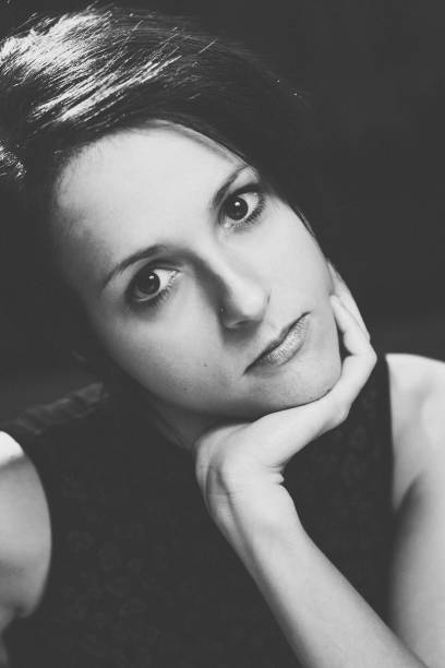 istock Studio portrait of beautiful woman 1165778583