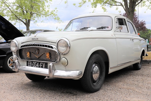 Peugeot 403 B7 white passenger car of the year 1965 - 250 hp engine with 6 cylinders - 3 rd meeting of old vehicles - Village of Saint Agnin sur Bion - Isère - 28th July 2019 - Front of the vehicle