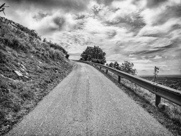 istock Mountain road in black and white 1165780634