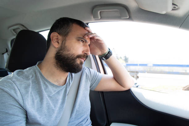 istock Nervous man driving a car 1165782491
