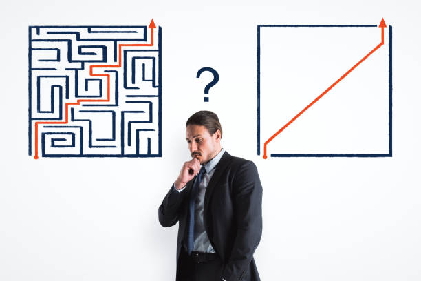 istock Businessman with maze 1165785379
