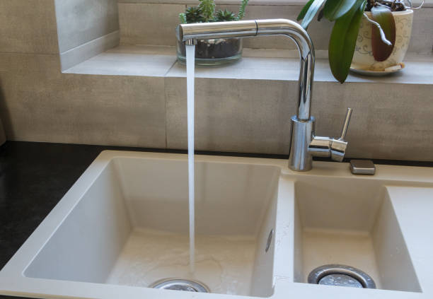 istock Sink of a kitchen 1165790271